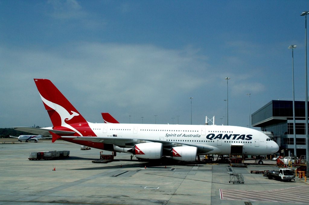 Melbourne airport showing a Qantas aircraft on the apron.