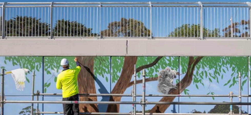A huge new art piece putting a fresh spin on Sunbury has been unveiled along the new Jacksons Creek road bridge underpass as part of the Sunbury Road Upgrade.