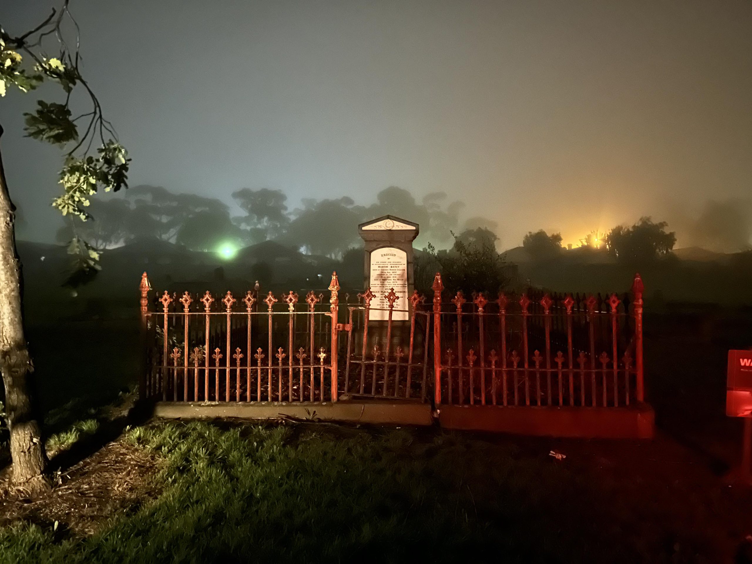 Sunbury Cemetery on a misty night. Photo by Dave White.