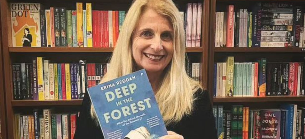 Erina Reddan with her new book Deep in the Forest