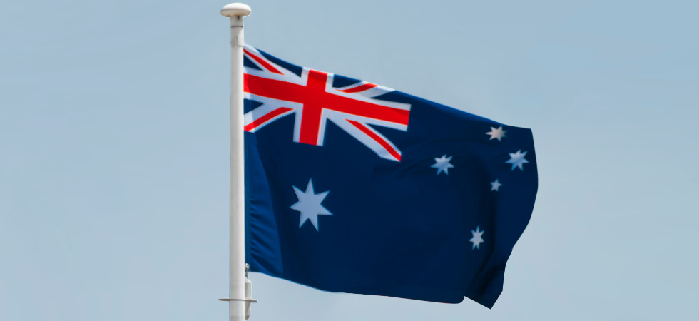 Australian flag flying from a pole.