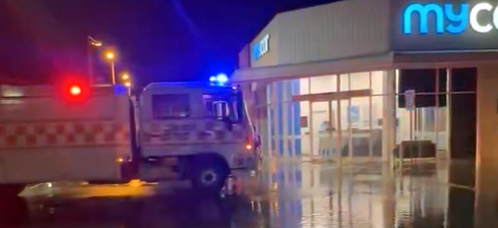The car park is flooded at Sunbury Square due to a burst water main. Photo / video grab