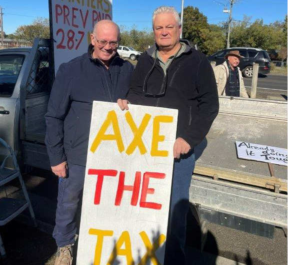 Axe the tax fire levy protest (Trevor Dance right)