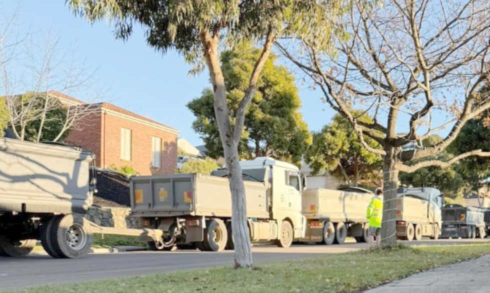 40-tonne trucks make their way down Canterbury Avenue, Sunbury.